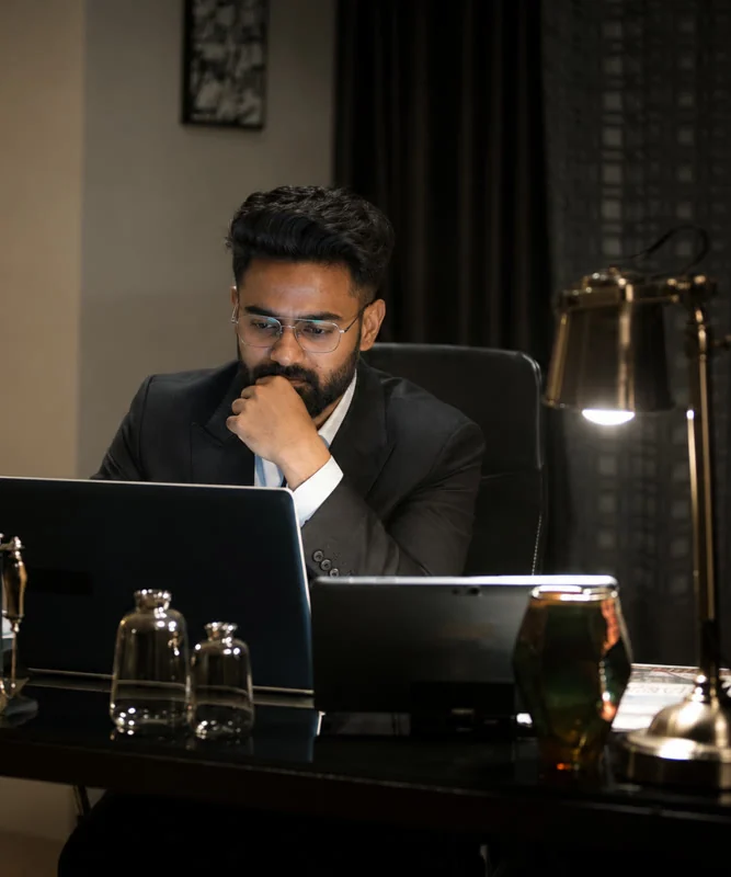 Priyank Singh working at his desk